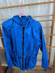 lot 124 image: Blue Hooded Windbreaker Jacket with Drawstring Waist