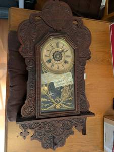 lot 150 image: Vintage Waterbury Clock Co. Wall Clock with Carved Wood Case Roman Numerals