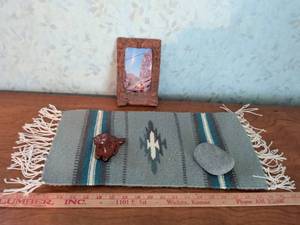 lot 197 image: Carved Frame with Train Photo Salina Kansas, Woven Textile Runner, Cat Figurine Lot