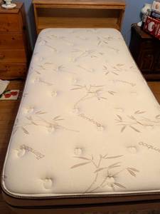 lot 220 image: Oh right now twin size bed with wood bookcase headboard and Bamboo Twin Mattress