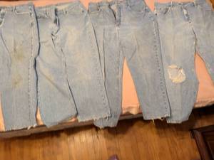 lot 225 image: Lot of 6 Light Wash Distressed Jeans with Rips and Tears