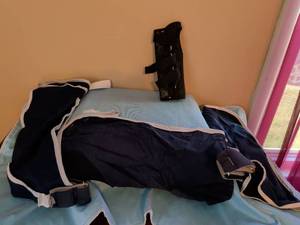 lot 308 image: Medical Leg Brace Support with Straps and Perforated Shell