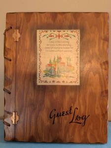lot 337 image: Guest Log Book with Wood Cover and Cross-Stitch Embroidered Insert
