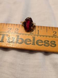 lot 379 image: Gold Ring with Red Stone Oval Setting 10K