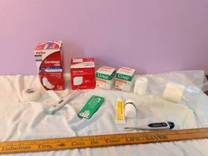 lot 519 image: First Aid Supplies Lot Meijer Bandage Roll Curad Gauze Pads Thermometer