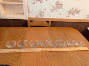 lot 559 image: Dessert cups by anchor and Pyrex and one measuring cup from pampered chef.