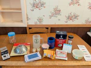 lot 562 image: Lot of Kitchen & Home Collectibles Morton Ice Cream Salt, Mugs, Cane Tips, Seasoning