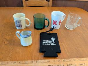 lot 584 image: Lot of 6 Ceramic and Glass Mugs with Black Koozies