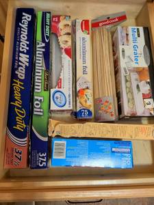 lot 607 image: Kitchen Cooking Supplies Lot Aluminum Foil Parchment Paper Skewers Grater
