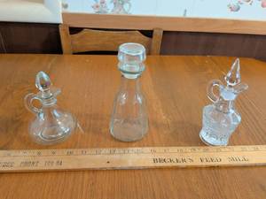 lot 632 image: 3 Glass Decanters with Stoppers and 1 Bottle with Stopper