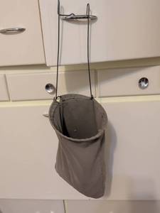 lot 704 image: Over-the-Door Hanging Laundry Bag with Metal Frame