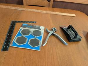lot 712 image: 4 Pack Furniture Sliders with Caster Wheel Tool and Brush Cleaner