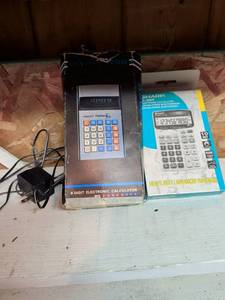 lot 867 image: Unisonic 790RM 8 Digit Electronic Calculator with Power Adapter