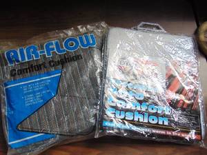 lot 3303 image: Vintage auto seat cushions in packaging