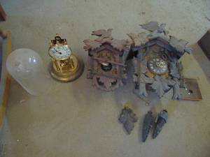 lot 3374 image: Cuckoo clocks and Anniversary clock - all need repair