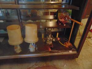 lot 3396 image: Lamps and Necklace holder - contents RH Side of display case