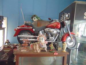 lot 3439 image: Motorcycle Model and Contents on top of display cabinet