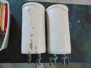 lot 3473 image: Pair of lye dispensers