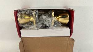 lot 18167 image: Door Knob Set Gold-Tone Finish with Hardware ( bright brass interior privacy knob) - Retail $0