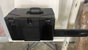 lot 18170 image: Black Plastic chainsaw box ( will hold up to an 18 bar) - Retail $0