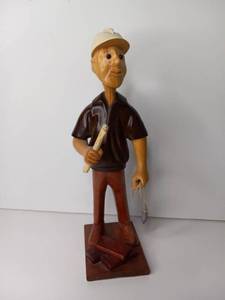 lot 6 image: Hand-Carved Wooden Fisherman Figure with Base, Approximately 11 inches