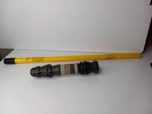lot 15 image: Disney Trading SVProdthur 400 Lightsaber Hilt Yellow Pole