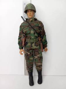 lot 62 image: Military Action Figure with Camouflage Uniform Helmet Rifle and Accessories