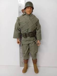 lot 63 image: Military Action Figure with Helmet, Uniform, Belt, and Rifle Accessory