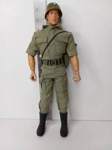 lot 68 image: Military Action Figure with Uniform Helmet and Rifle Accessory