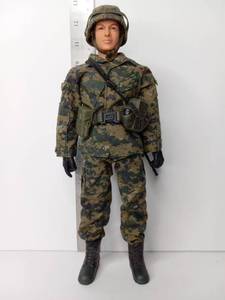 lot 70 image: Military Action Figure with Flecktarn Uniform Helmet and Rifle Accessories