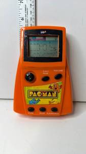 lot 112 image: MGA Pac-Man Handheld Electronic Game Orange