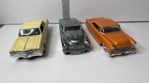 lot 135 image: Diecast Model Cars Lot of 3 Classic Coupes Yellow Gray Orange