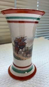 lot 1007 image: Czechoslovakian ceramic trumpet vase (approximately 6 inches tall) featuring a detailed coaching scene transfer and distinct red and green striped bands.