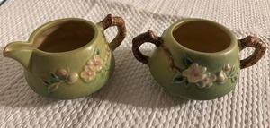 lot 3019 image: Roseville Pottery Sugar Bowl and Cream Pitcher Apple Blossom Green