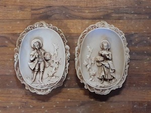 lot 3030 image: Pair of Oval Relief Plaques with Floral and Botanical Motifs - 8 Inch
