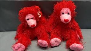 lot 4045 image: A Matched Pair Flame the red bear from the TY Punkies Collection, released in 2003 with textured fur, a pink face, and a distinct plastic heart-shaped nose.