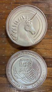 lot 5005 image: Frankoma Trivets White Glaze Unicorn and Owl Design 6 inches diameter with felt tipped feet