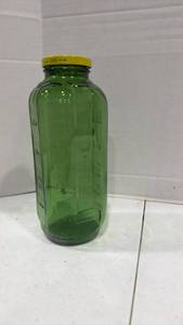 lot 1037 image: Green glass jar