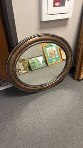 lot 1079 image: Oval mirror 28 x 34 in