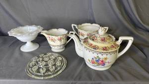 lot 247 image: Glass Flower Frog, Milk Glass and Tea Set