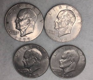 lot 518 image: 1977 Dwight D Eisenhower United States One Dollar 4-Coin Lot