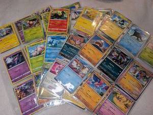 lot 559 image: Pokmon Trading Card Game Lot Mixed Cards Multiple Types- 90 Cards