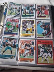 lot 721 image: Sports Card Collection Binder NFL Football Cards - 12 Sheets in a Binder