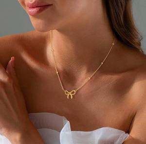 lot 19978 image: Bow Necklace for Women 18K Gold Plated Cute Bow Choker JewelrySmall Tiny Bow Pendant Choker Chain Necklace Trendy Necklaces for Women Teen Gold Jewelry Gift - Retail $15