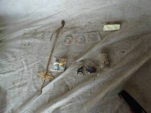lot 38005 image: Lot of Misc. Collectible coins, collectible lighters, broaches, palm tree necklace spider man key chains