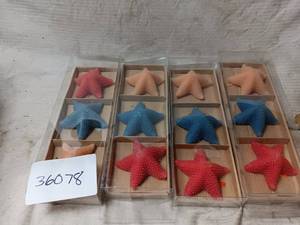 lot 36078 image: Four 3-packs of candles shaped like starfish