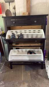 lot 52380 image: Black Dresser with 3 Drawers and Shoe Storage Organizers