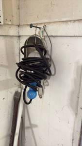 lot 52433 image: Portable Work Light with Black Cord and Blue Plug