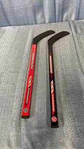 lot 3077 image: Warrior Hockey Sticks Pair WR 27
