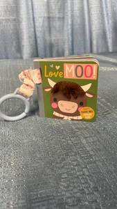 lot 3105 image: Cloud Island Love Moo Babys Touchy Feely Stroller Board Book